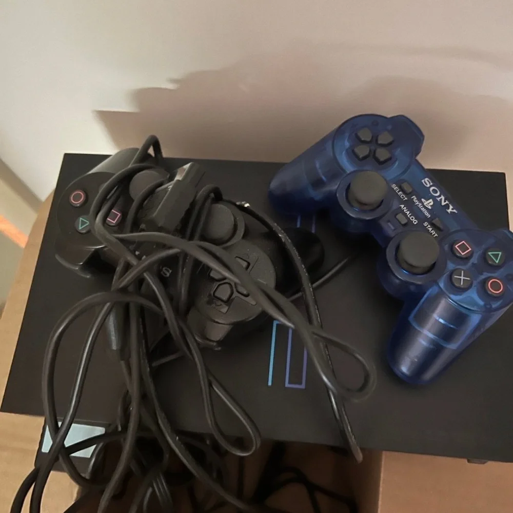 Sony PlayStation 2 Console with 1 Black and 1 Blue Controller